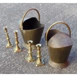 Two pairs of late Georgian brass baluster candlesticks, each on a circular foot, square base, H 24.