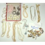 Quantity of necklaces, paired earrings, rolled gold bracelet, and other items (a lot)