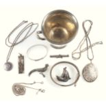 Silver including a mug with indistinct marks, two bracelets, three brooches, silver ingot pendant,