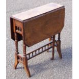 A late Victorian walnut boxwood lined and marquetry inlaid Sutherland table, with moulded edge on