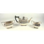 George V silver 3 piece tea set comprising a rounded rectangular moulded teapot with a gadrooned