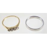 White metal wedding ring stamped 750, and an 18ct gold ring set 4 diamonds, 3.9grs (2)