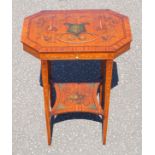 An Edwardian satinwood worktable inlaid with kingwood, ebony and boxwood, the octagonal hinged top