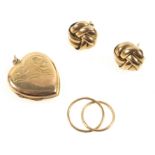 Pair of 9ct. gold crossover stud earrings, double ring earring, and a heart shaped locket, gross