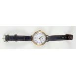 9ct. gold wristwatch with a circular white enamelled dial inscribed ?J W Benson, London?, and