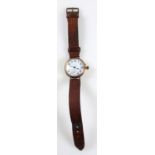 Presentation gold wristwatch with a circular white enamelled dial and seconds dial, the back with