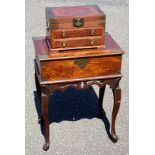 An Eastern amboyna, hardwood brass mounted rectangular box on stand, the hinged lid opening to