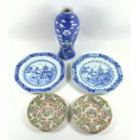 Pair of 19th century Chinese octagonal plates, decorated in under glaze blue with pagodas in a