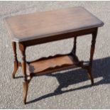 Edwardian oak rectangular table with a moulded top and galleried undertier on 4 downcurved legs,