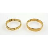 18ct. gold wedding ring by B W & Son, London 1962, and an 18ct. crossover ring, 5.6grs (2)