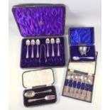 Set of 6 silver scroll handled coffee spoons and a pair of sugar tongs, by Harrison Brothers and