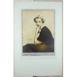 Three black and white photographs of ladies taken by Society photographer Dorothy Wilding, all