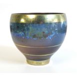 Sutton Taylor (born 1943) A mottled blue and grey lustre banded footed bowl, speckled decoration