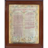 An 18th century religious sampler worked by Joanna Maxwell in 1773, ? The Ten Commandments, God