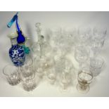 A set of 7 Edinburgh Crystal cut glass wines, bearing lion rampant mark, a pair of glass decanters