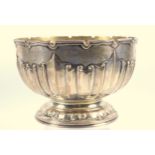 George V silver circular rose bowl with fluted scrolls, on a circular foot, by GH, Sheffield 1922,