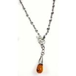 Oriental white metal and cabochon amber bracelet, white metal scroll link necklace with amber