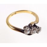 18ct yellow gold diamond trilogy crossover ring, size L 1/2, set with three sparkling round cut