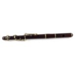 A Boozey & Co, London, rosewood white metal mounted piccolo, stamped Boozey & Co 19380, makers,