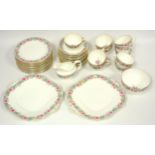 An Aynsley bone china 37 piece tea set, floral printed comprising, tea cups and saucers, plates,