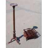 Late 19th early 20th century mahogany torchere, the dish top raised on a foliate carved and reed