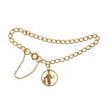 9ct. gold curb-link bracelet with a figure pendant, 8.4grs