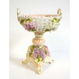 Late 19th century German Coburg porcelain comport with a pierced circular bowl and floral