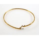 Middle Eastern flexible bracelet with cut decoration, stamped “22K?”, 8.6grs