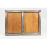 Peruvian white metal mounted rectangular double photograph frame with floral corners, stamped “925”,