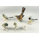 Four Karl Ens models of birds, Crown Staffordshire bird and another bird (6)