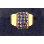 Foreign yellow metal ring set 15 sapphires, stamped 18K, gross 4.4grs