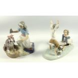Lladro group of 2 children on a see-saw with a puppy, W 23.4cm and a group 'Take your medicine',