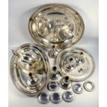 Peruvian white metal part dinner service comprising an oval dish with a petal and beaded border, W