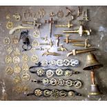 Good quantity of vintage brass brewery barrel taps, cast bells, other brass ornaments, horse brasses