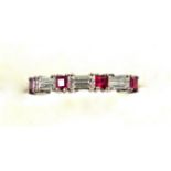 18ct white gold ring, size K, set 4 emerald cut rubies and 3 baguette diamonds, by SFJ, London 1991