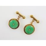Pair of Chinese yellow metal and jade roundel and dumbell cufflinks, stamped 18K, D 1.8cm, gross 9.