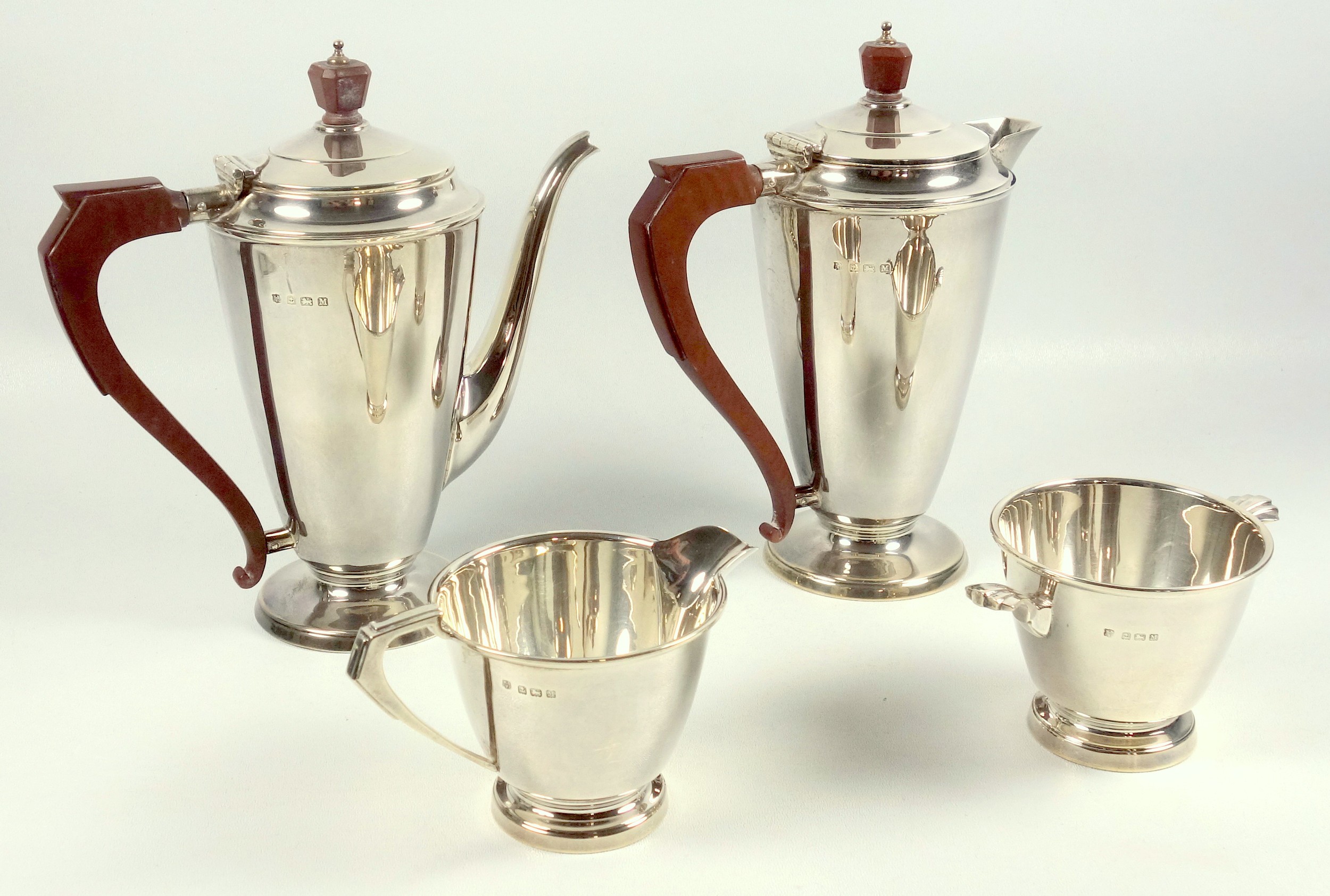 Art Deco silver 4 piece coffee set comprising a coffee pot, hot milk jug, sugar basin and cream jug,