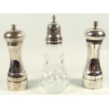 Pair of silver mounted salt and pepper mills, by M & H, London 1980, H 15.2cm, and a cut glass