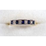 18ct gold ring with 5 emerald cut sapphires and 4 illusion set diamonds, by AT Ltd, London 1978,