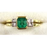 Italian yellow metal bifurcated ring, size O 1/2, set emerald, 5 x 5mm, with diamond shoulders