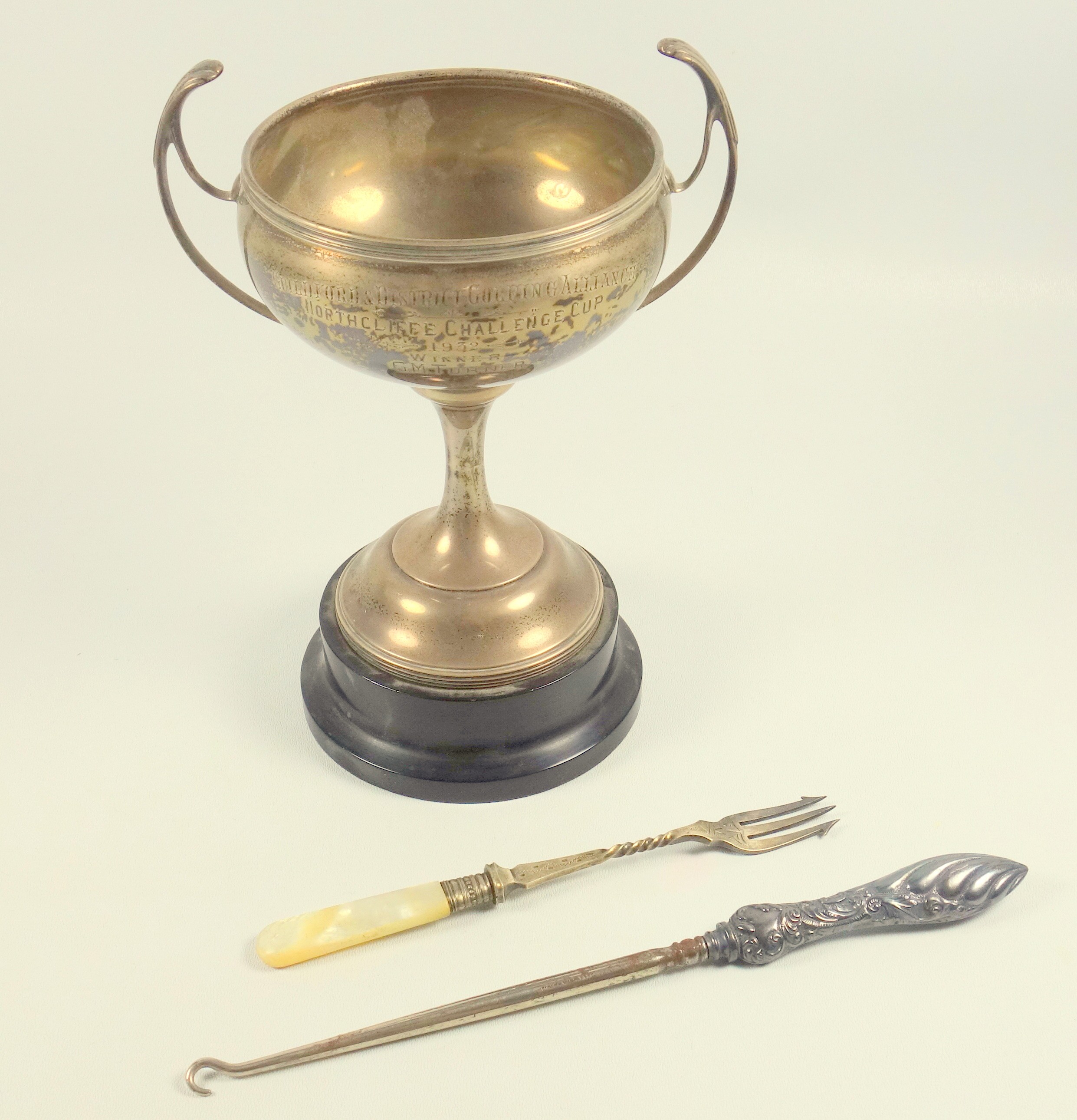 Golfing interest: George V silver 2-handled cup with inscription “Guildford & District Golfing