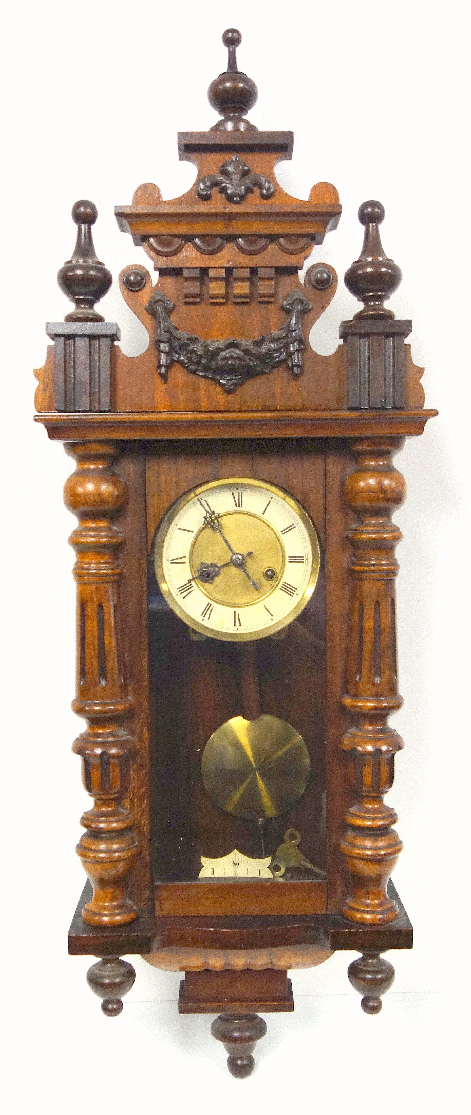 A Viennese style regulator with an 8 day striking movement in a stained beech case, 94 cm long