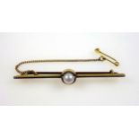 15ct gold bar brooch set cultured pearl, W.5.7cm, gross 3.5grs