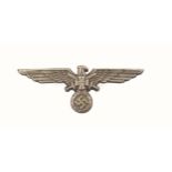WW2 German Eagle and crossed swords cap badge, the reverse with three metal prongs and stamped 3