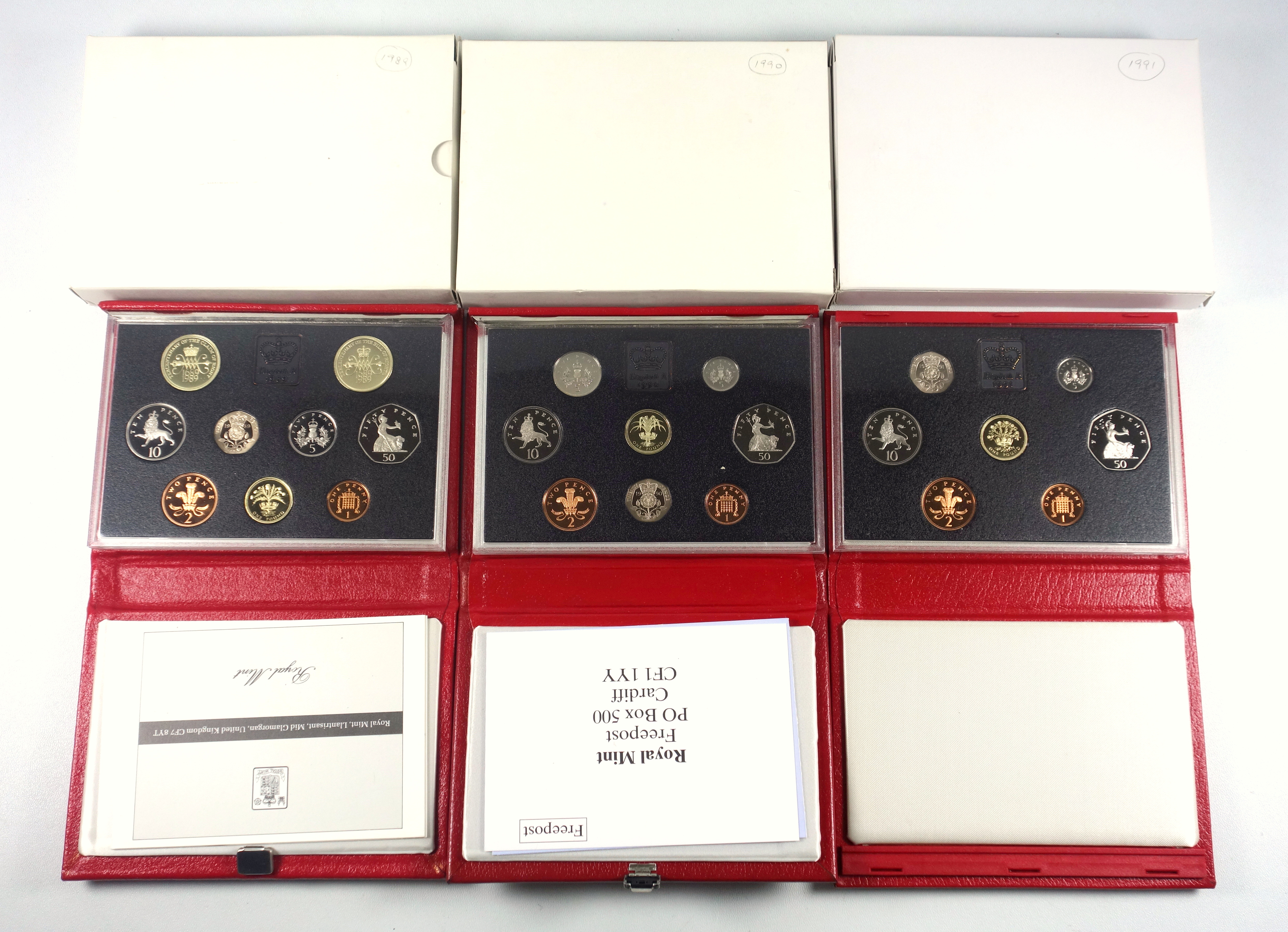 Elizabeth II Proof sets of coins, 1983-85 and from 1986-91, with C of As, in de luxe cases,