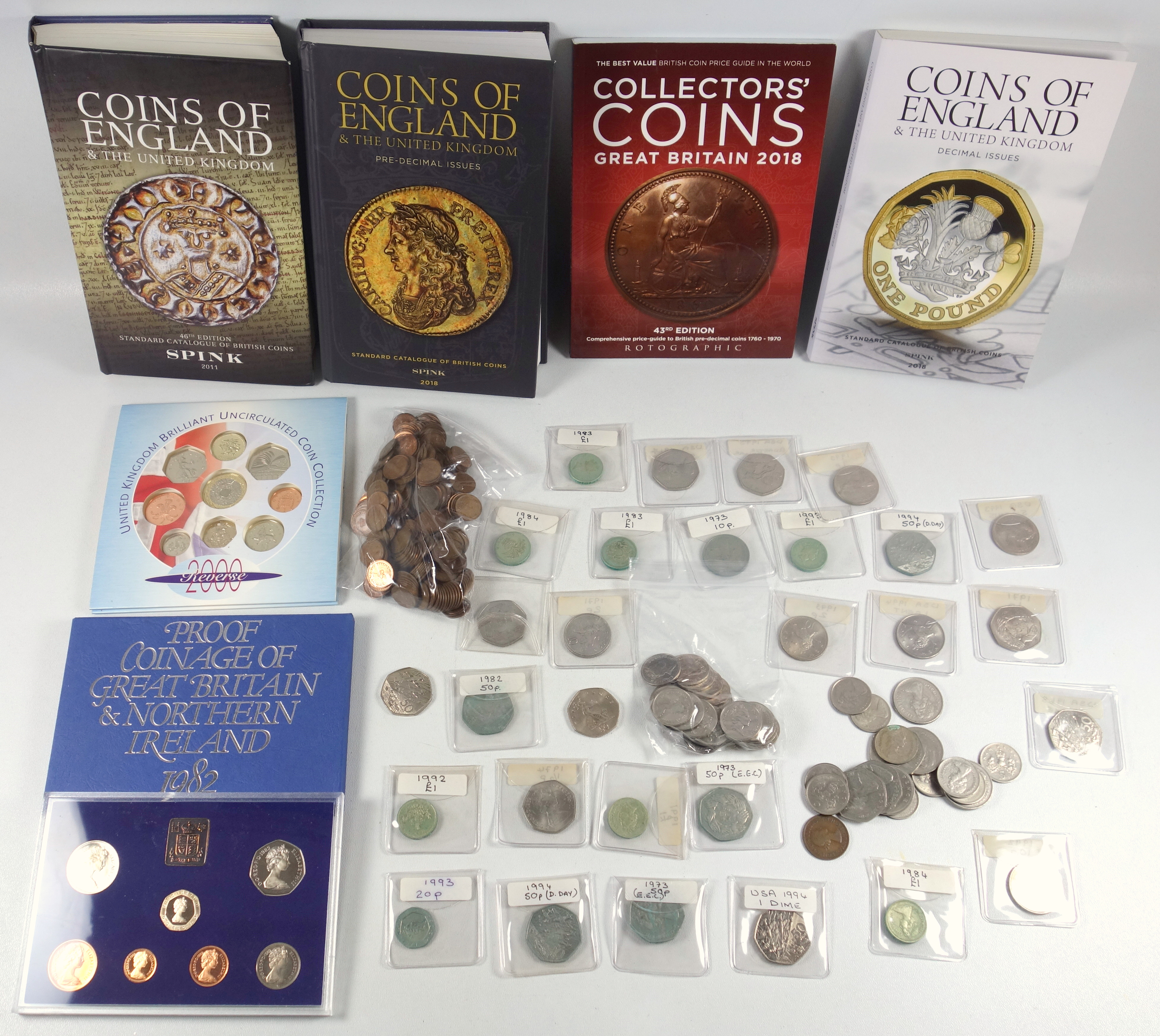 Royal Mint Proof set of coins, 1982, in card folder; uncirculated set, 2000, in card folder; First