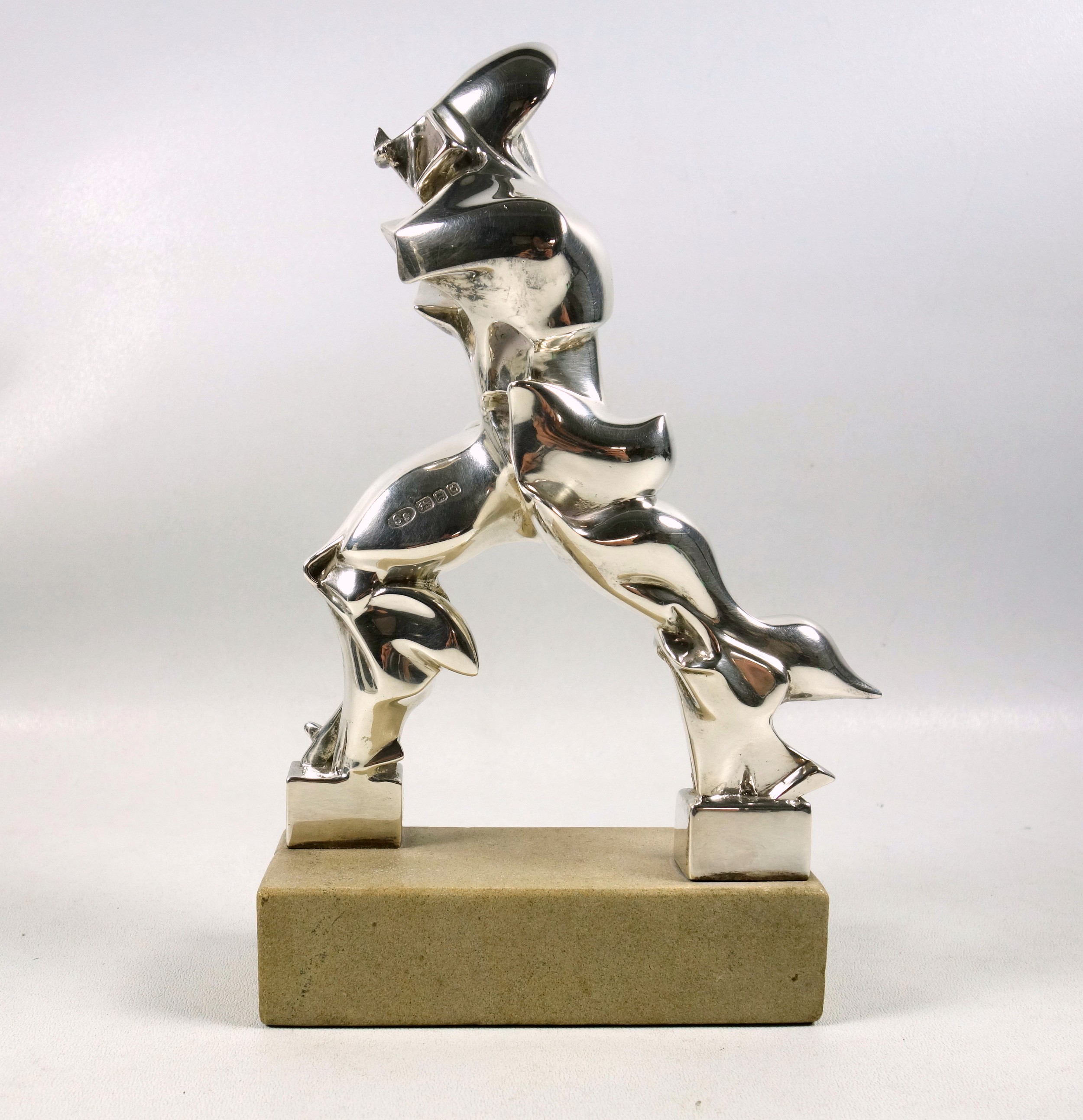 Silver model of a "futuristic man" hallmarked SS London 1988 in the style of Umberto Boccioni, 21.