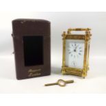 Rapport London gilt brass carriage clock, white Roman numeric and Arabic dial, subsidiary arabic