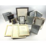 11 silver plated rectangular photograph frames, largest 28.4 x 23.3cm, and a double folding frame (