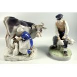 Bing and Grondahl figurine 2017 of a maid milking a cow. 20cm tall. Royal Copenhagen figurine 627 of